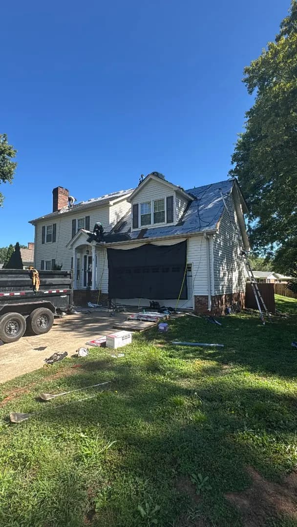 Residential roof removal and preparation in progress