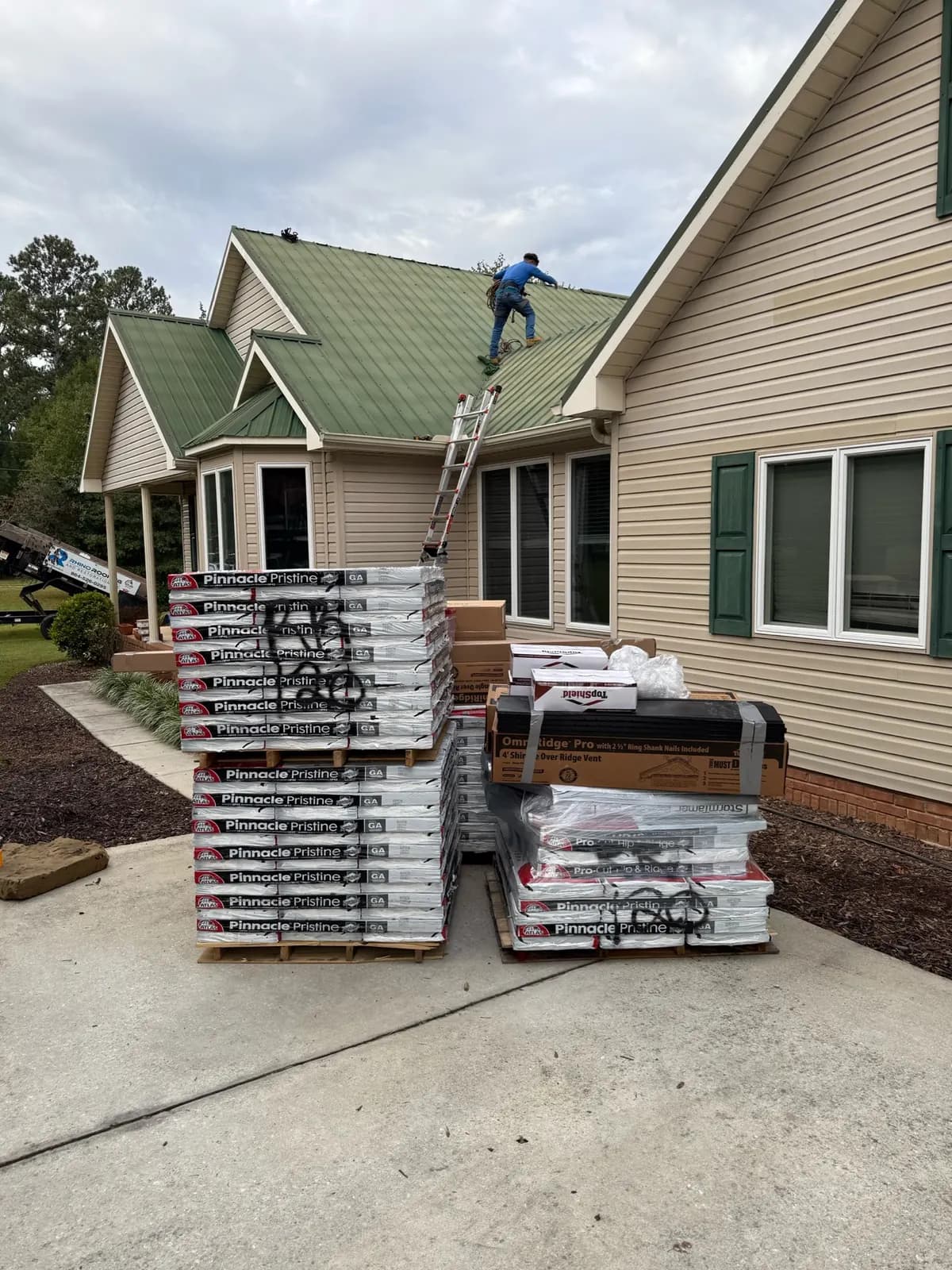 Shingle bundles delivered for a residential roofing project
